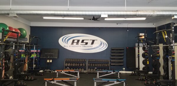 Customized wall murals of AST installed by Windy City Signs & Graphics in Chicago